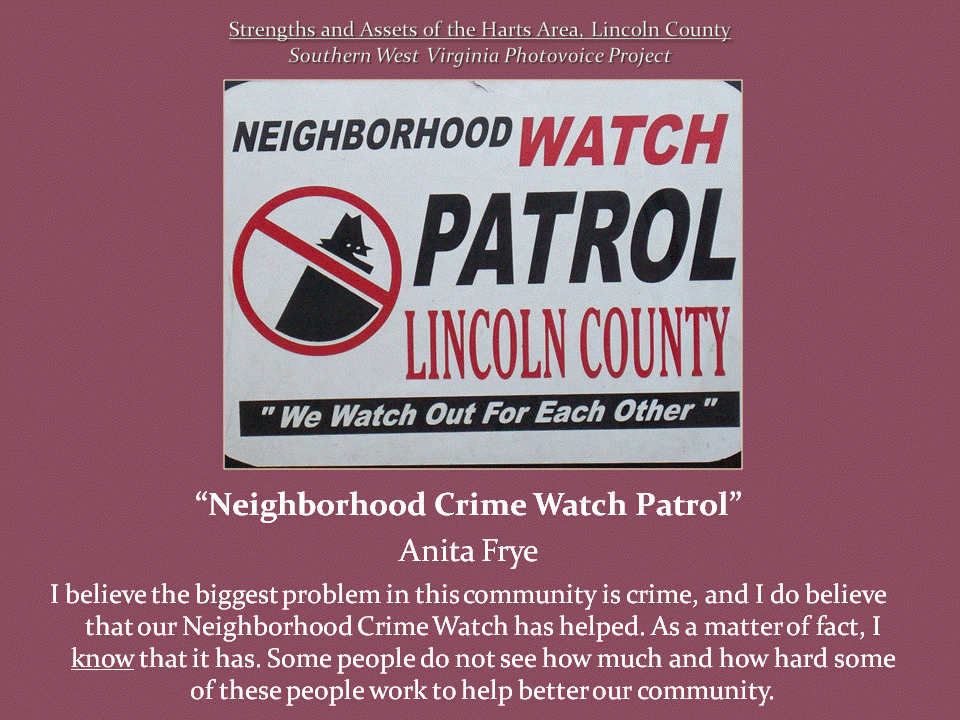 A white sign reads "Neighborhood Watch Patrol Lincoln County" with a crossed-out burglar symbol and community slogan.